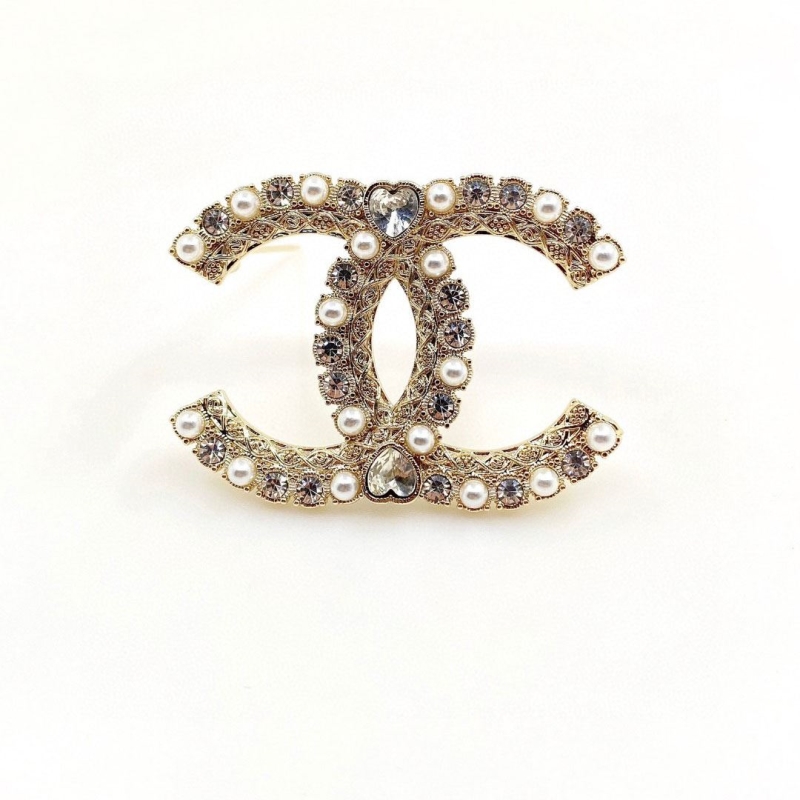 Ch*el brooches